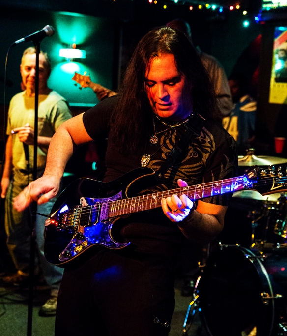 Guitarist, Ryan Maza shreds the stage part with fluttering whammy bar antics.